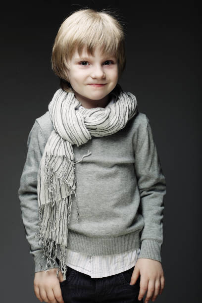 istock Image of funny young boy over gray background 2164027467