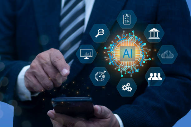 istock Businessman use smartphone with working of Artificial Intelligence (AI) Automation. chatbot, robot AI, analyze customer data, business and technology 2164029774