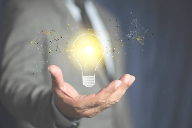 istock Businessman holding a light bulb and imagination, Creative thinking ideas and innovation technology, Solution analysis and development network connection. inspiration concept. 2164029780