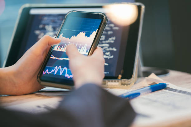 istock Business financial working on Laptop Implementing AI Data Solutions iots for customer 2164032959