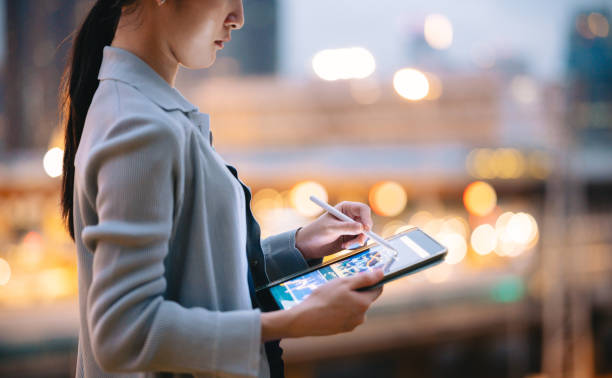 istock Gen Z working on digital devices to create AI data models role of data science in AI development. tech and data science technology 2164032991