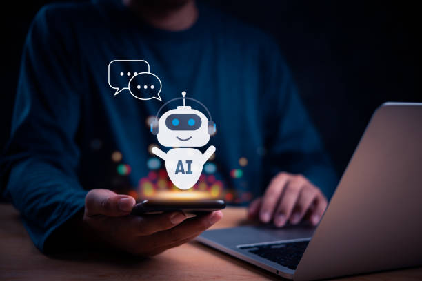 istock Person using smartphone with holographic AI chatbot, representing virtual assistance and digital interaction. Ideal for tech, customer service, and innovation content. 2164034416