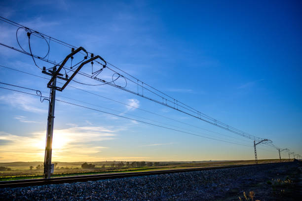 istock Railway Catenaries at Sunset in Carrion de los Cespedes 2164041227