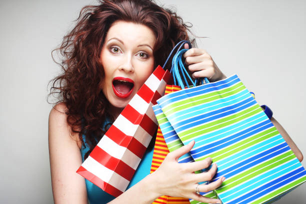 istock Happy shopping woman 2164042328