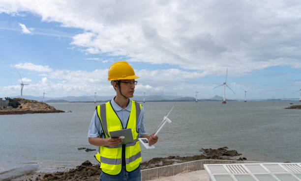 istock Electricians at work at offshore wind farms 2164044698