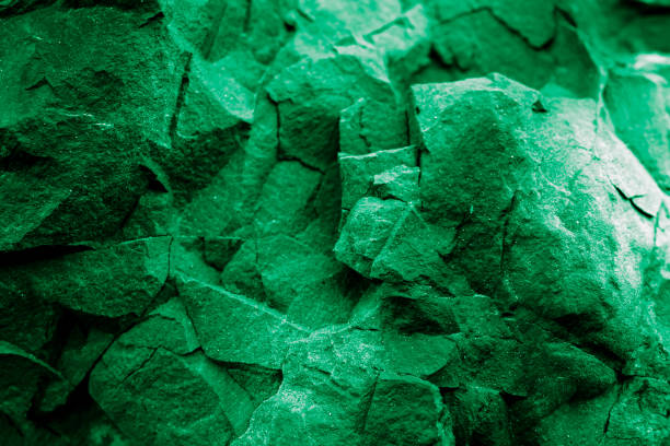 istock green background of stones, mining origin 2164044906