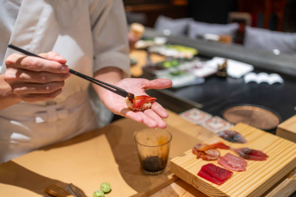 istock Chef is making Japanese Omakase in the restaurant 2164047460