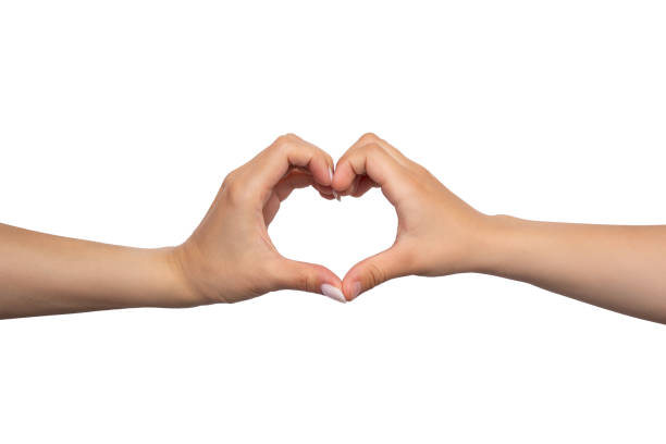 istock Child and mother making a heart with their hands 2164047968