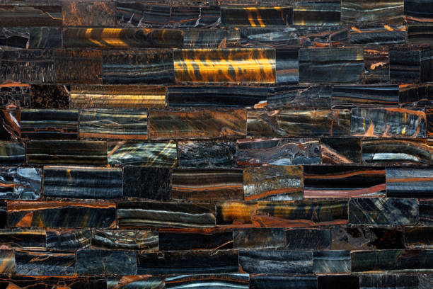 Tiger Eye Blue slab. Semi precious pattern. Exclusive luxury gemstone background. Polished semiprecious stone for ceramic wall and floor digital tiles.