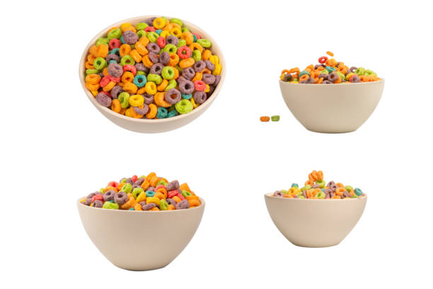 istock Colorful rings cereal spill out into a bowl. Breakfast. Isolated. 2164053272