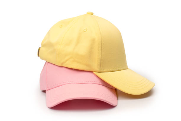 istock Pink and yellow cap isolated on white background. 2164053303