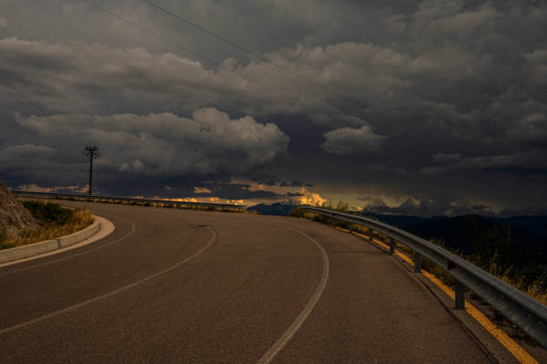 a summer sunset over the mount Volturino with a cloudy skye in the background, Val D'Agri, Basilicata