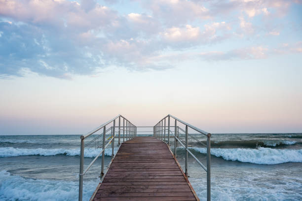 A pier and sea view on the beach