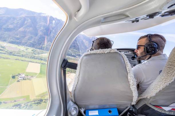 istock Pilots Flying Over Scenic Landscape 2164060147