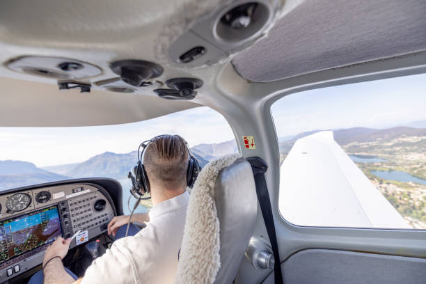 istock Pilot Flying Over Scenic Landscape with Mountain and Lake Views 2164060998