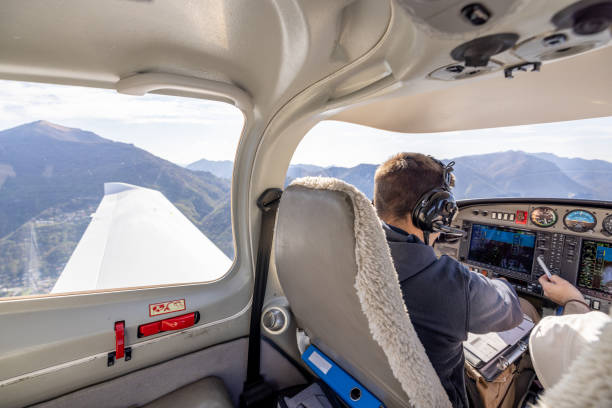istock Cockpit View of Pilot Flying Over Mountains 2164061000