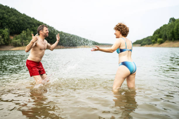 istock Friends enjoying in lake 2164061963