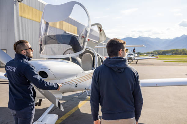 istock Ground Crew and Pilots Preparing Light Aircraft 2164063925