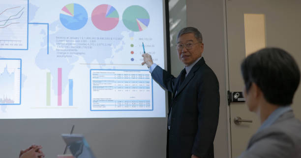 istock senior executive businessman do presentation 2164069340