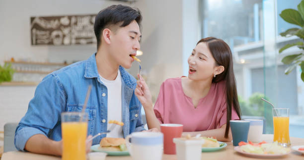 istock couple have breakfast or brunch 2164074862