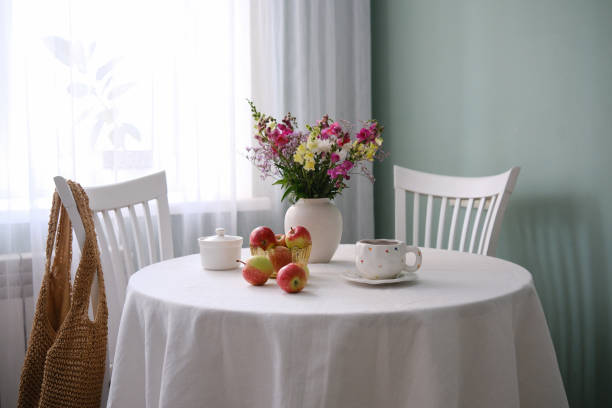 istock A Charming and Inviting Table Setting Featuring Bright Apples and Beautiful Fresh Flowers 2164085069