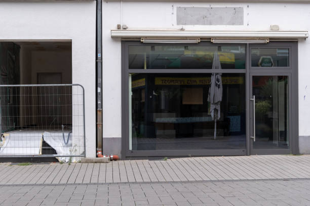 istock windows of a desolated shop 2164087881