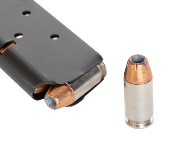 Isolated pistol magazine loaded with hollow points