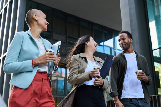 istock Group of businesspeople talking during coffee break 2164106777
