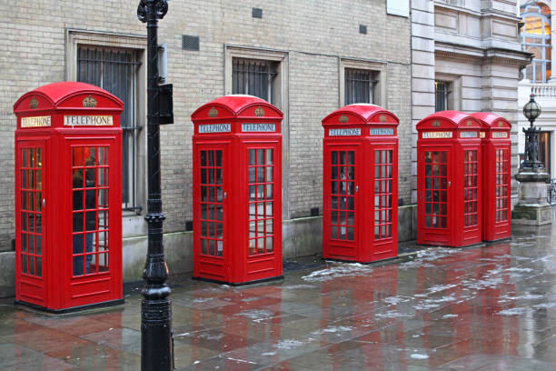 Red Telephone Booths at West End in London at Cold Winter Day