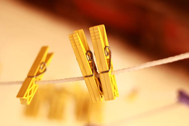 istock Clothes Line with Clothespins 2164113395