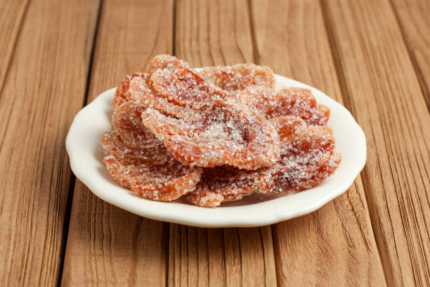 istock Candied nutmed on a white plate. 2164115601