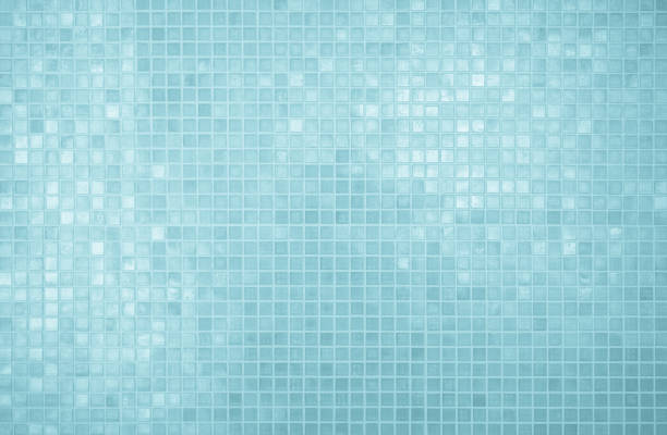Blue light ceramic wall chequered and floor tiles mosaic background in bathroom, kitchen. Design pattern geometric with grid wallpaper texture decoration pool. Simple seamless abstract surface clean.