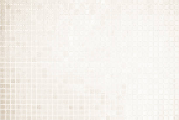 istock Cream light ceramic wall chequered and floor tiles mosaic background in bathroom, kitchen. Design pattern geometric with grid wallpaper texture decoration pool. Simple seamless abstract surface clean. 2164115763