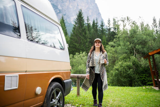 istock Lovely morning on camping with a van. 2164116040