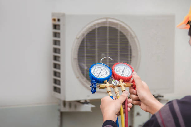 istock Engineer checking operation of air conditioner, maintenance concept 2164126884