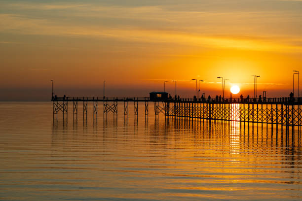 a sunrise on the pier