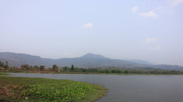 istock The mountain range in the dam has grass in front 2164134884