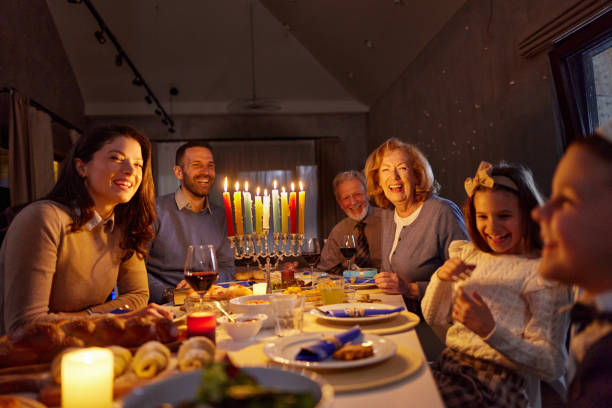 istock Happy extended family having dinner on Hanukkah. 2164134997