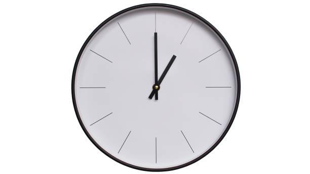 istock Minimalist Black and White Wall Clock on White background - Perfect for Time Management and Scheduling Concepts - 2164135882