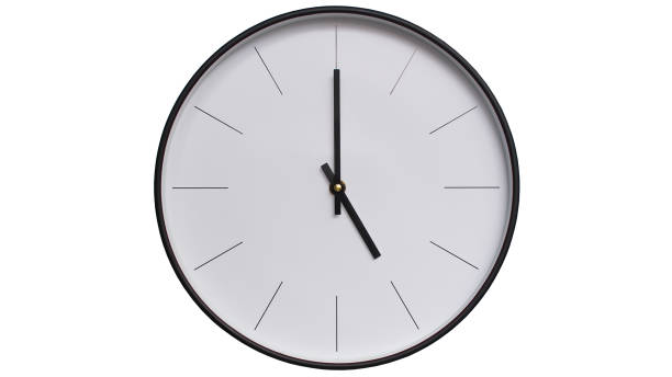 istock Minimalist Black and White Wall Clock on White background - Perfect for Time Management and Scheduling Concepts - 17.00/05.00 2164135895