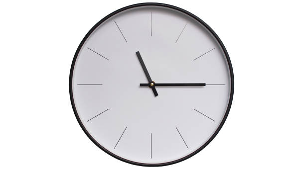 istock Minimalist Black and White Wall Clock on White background - Perfect for Time Management and Scheduling Concepts - 23.15/11.15 2164135933