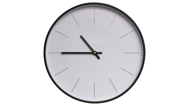 istock Minimalist Black and White Wall Clock on White background - Perfect for Time Management and Scheduling Concepts - 10.45/22.45 2164135934