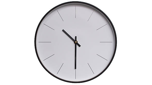 istock Minimalist Black and White Wall Clock on White background - Perfect for Time Management and Scheduling Concepts - 22.30/10.30 2164135935