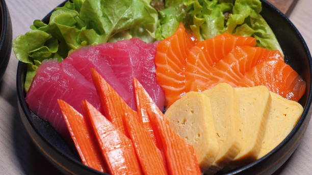 istock Fresh Sushi Platter with Assorted Fish, Vegetables, and Tamago Egg, 2164138718