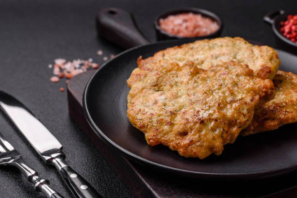 istock Delicious fried pork or chicken chops breaded with salt and spices 2164139813