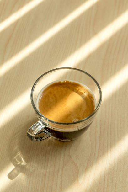 istock A cup of coffee is on the wooden table. 2164140008