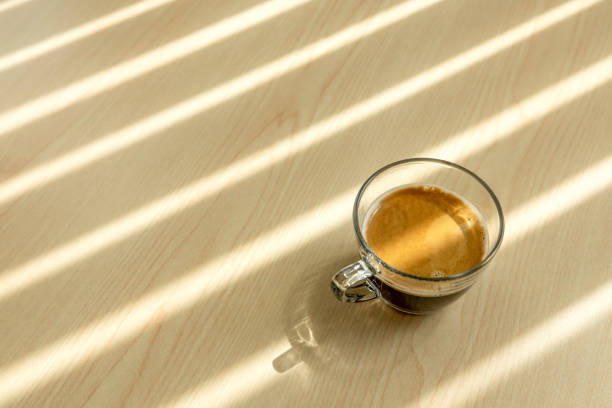 istock A cup of coffee is on the wooden table. 2164140041