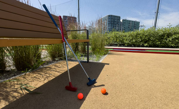 istock Closeup of player play mini golf with ball 2164141511