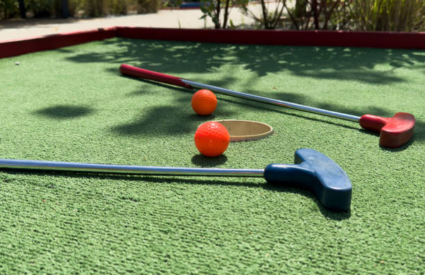 istock Closeup of player play mini golf with ball 2164141638