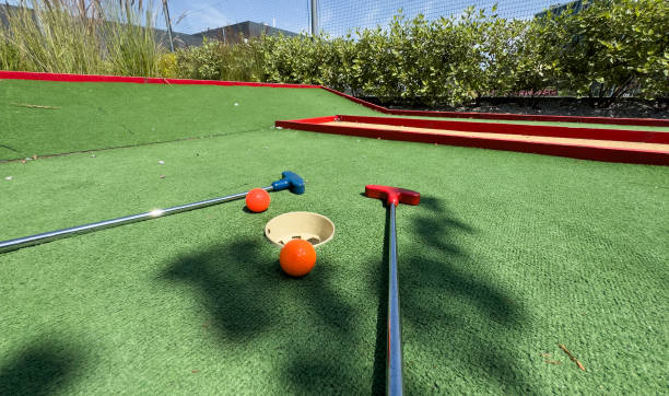 istock Golf stick and ball on green grass close up. 2164141727